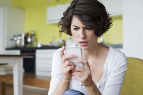 Woman receiving a text message