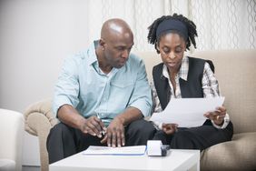 Husband and wife doing their taxes