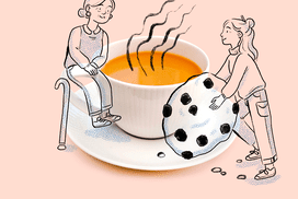 老女人和年轻的女儿坐在咖啡杯说话”width=