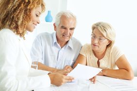 Senior couple meeting with a financial advisor