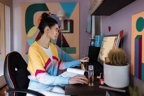 Freelancer working on a computer in a home office