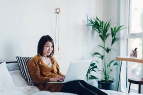 Young woman working on laptop