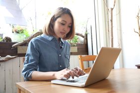 woman using laptop