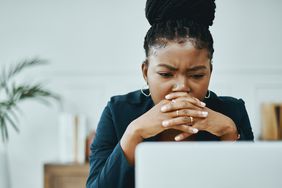 A person looks at a computer.